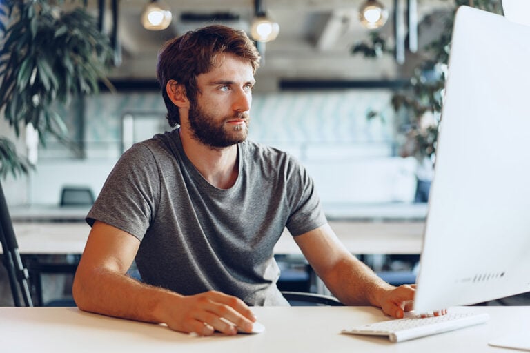 Man working at a desktop computer
